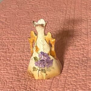 Small antique, porcelain vase. It looks to be very old, 4” h gold trim
